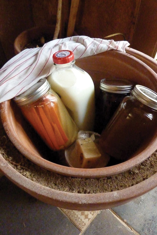 Energy-miser strategies, such as using this clever DIY “refrigerator” of cool sand and crockery, help make a difference. The accumulation of small acts grows into mountains of positive change.